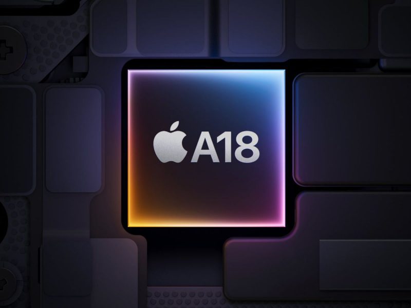 Gambar menampilkan chip Apple A18 yang modern, dengan desain elegan dan latar belakang berwarna gelap.